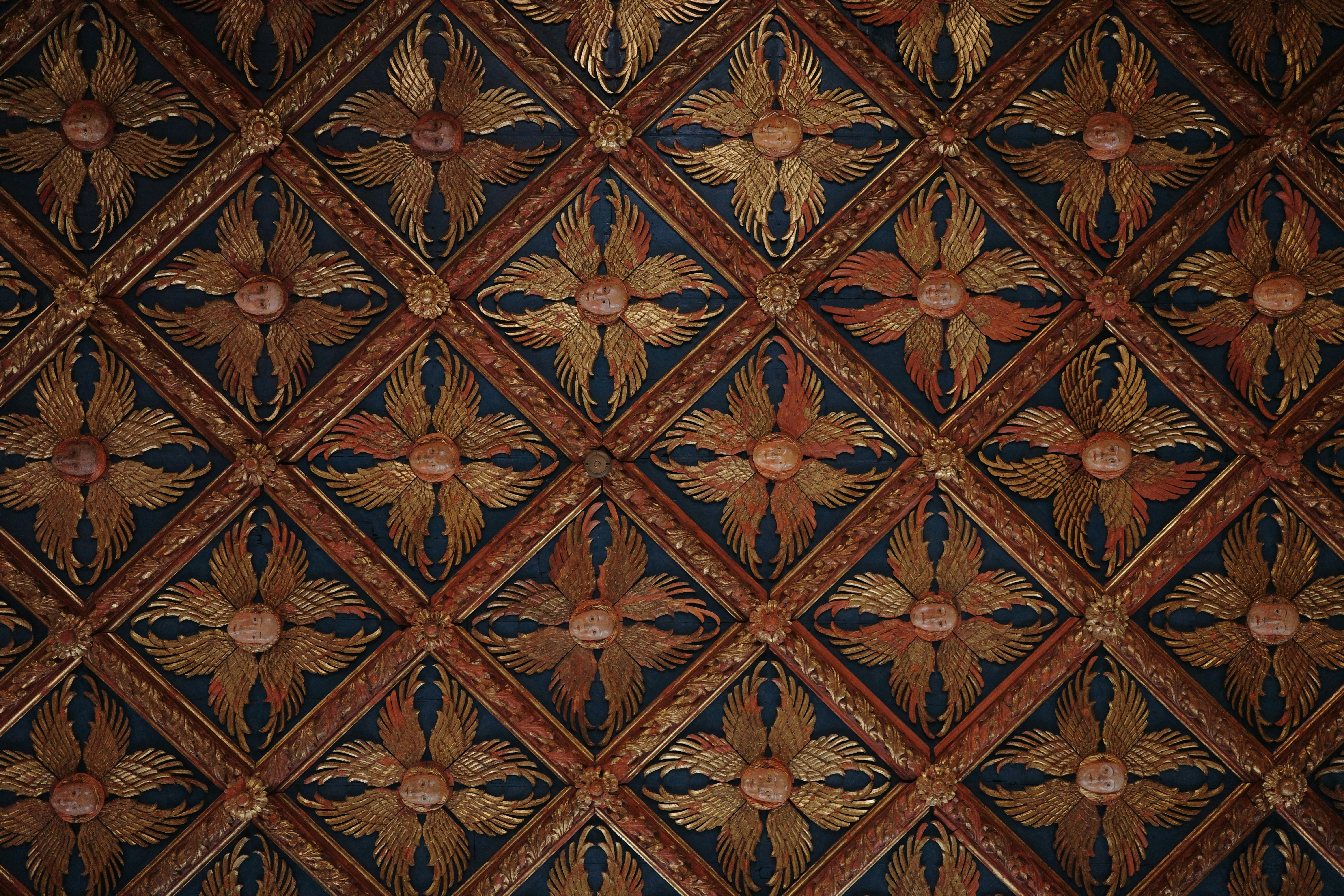 Intricate wooden ceiling with floral diamond patterns