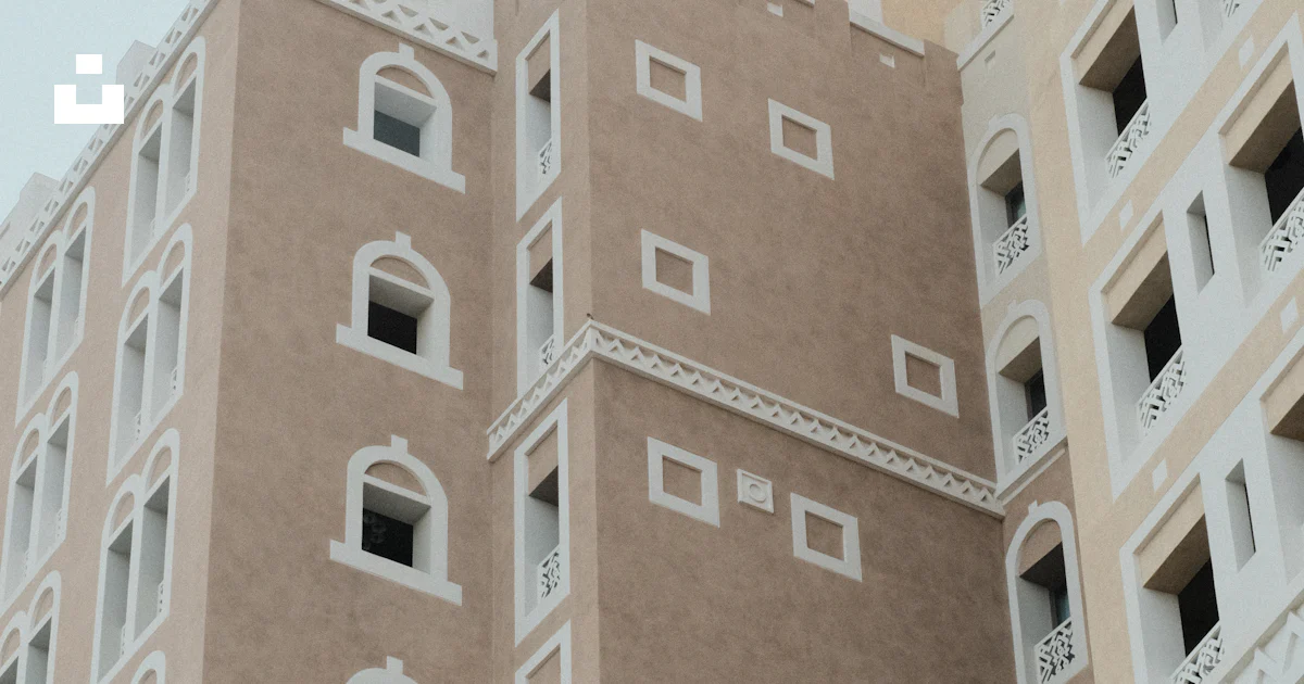 Tan Building Texture Modern tan buildings with white trim and windows. photo – Free Building ...