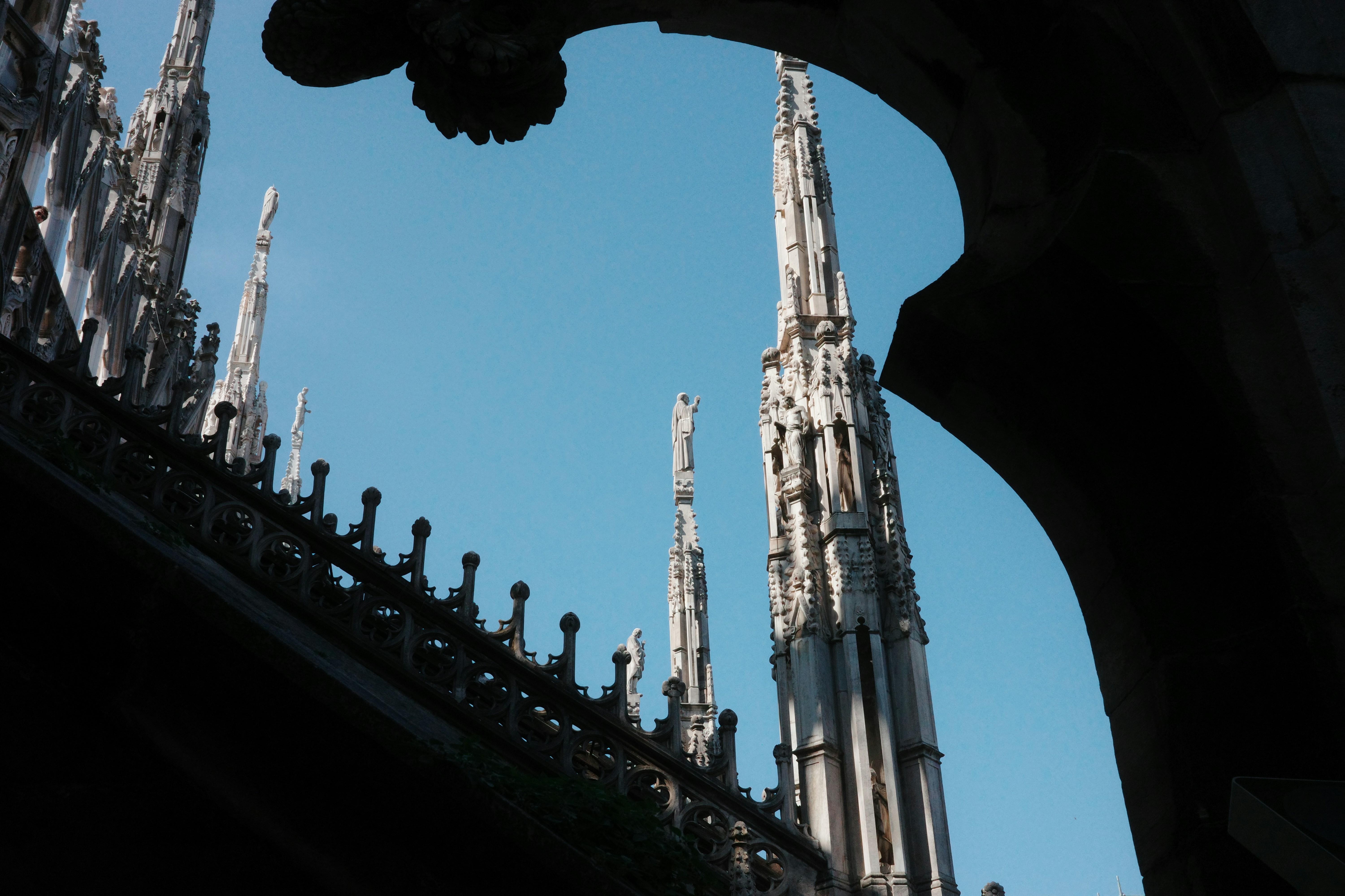 Gothic cathedral spire with intricate finial - decorative roof finials