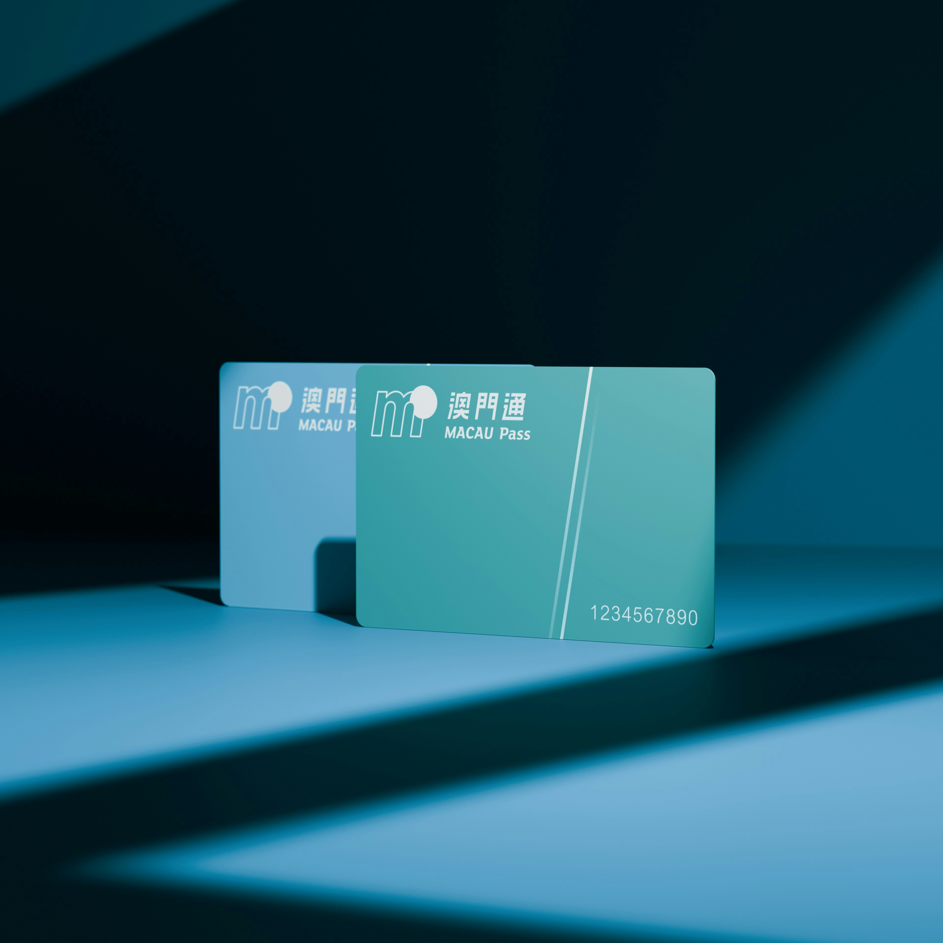 Two macau pass cards with blue and green backgrounds.