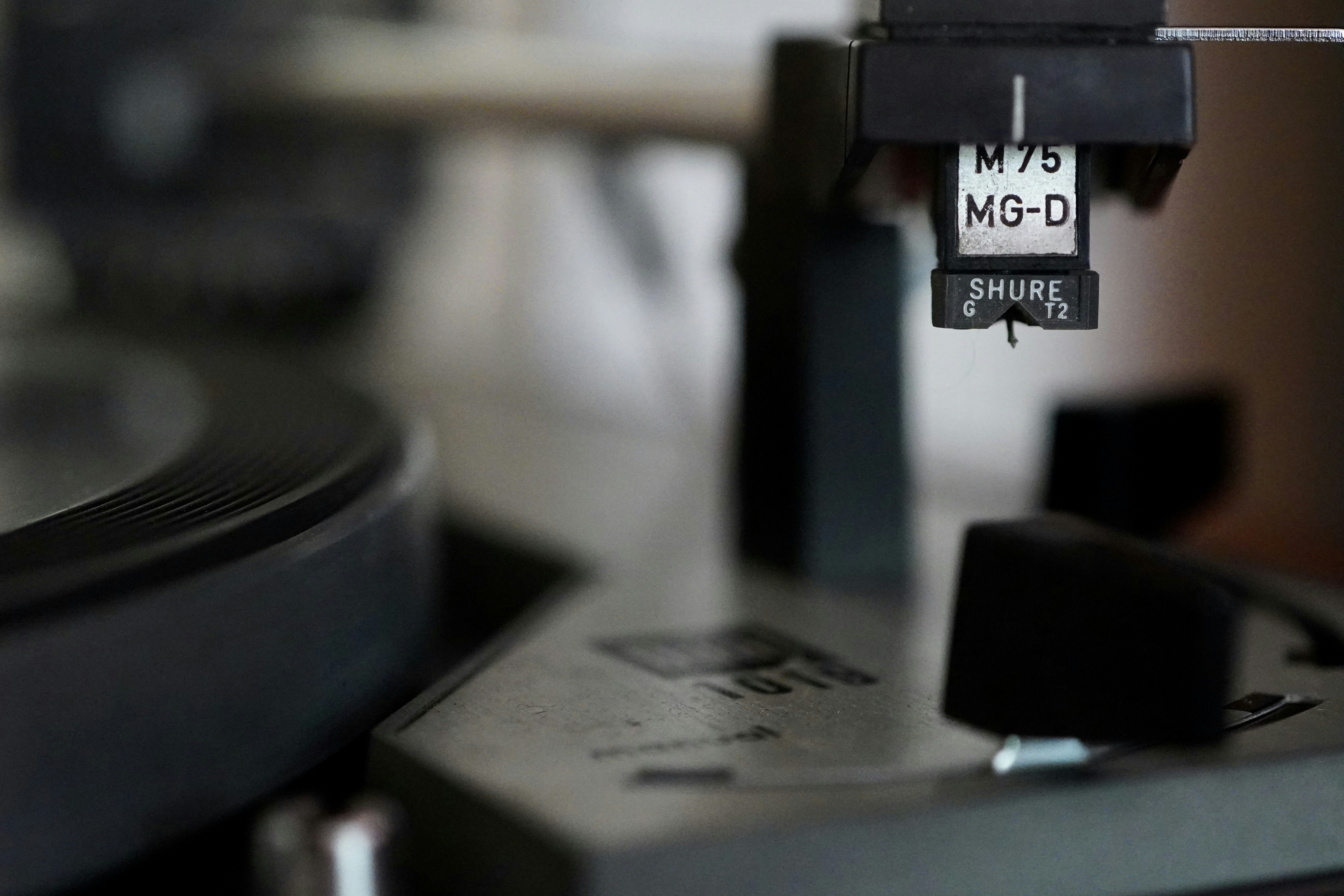 Close-up of a turntable needle over record.