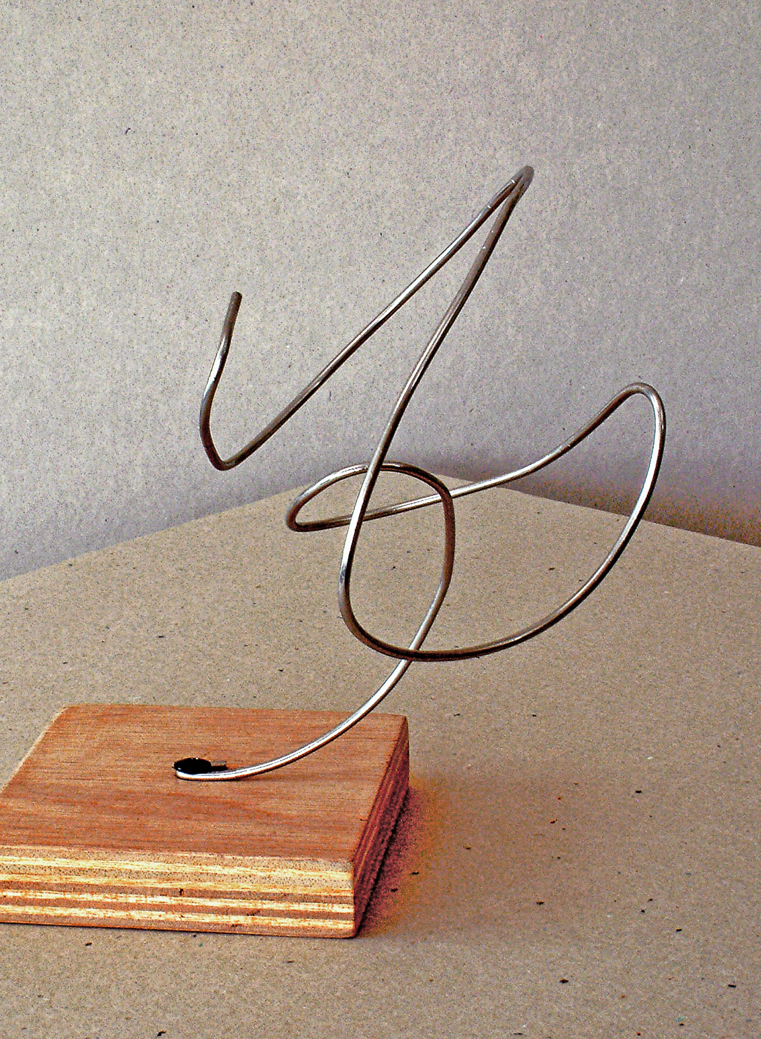 Current placeholder for A curved arrow indicating a bend.
