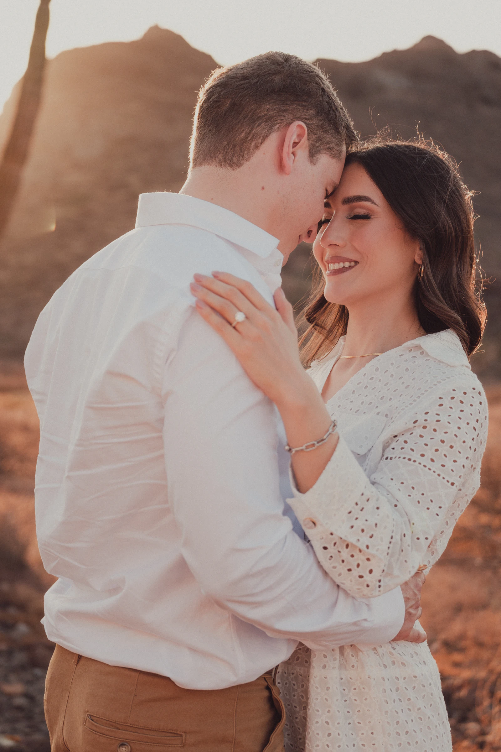 Couple photographed at golden hour in the Arizona desert