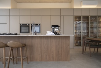 Modern kitchen with island and bar stools