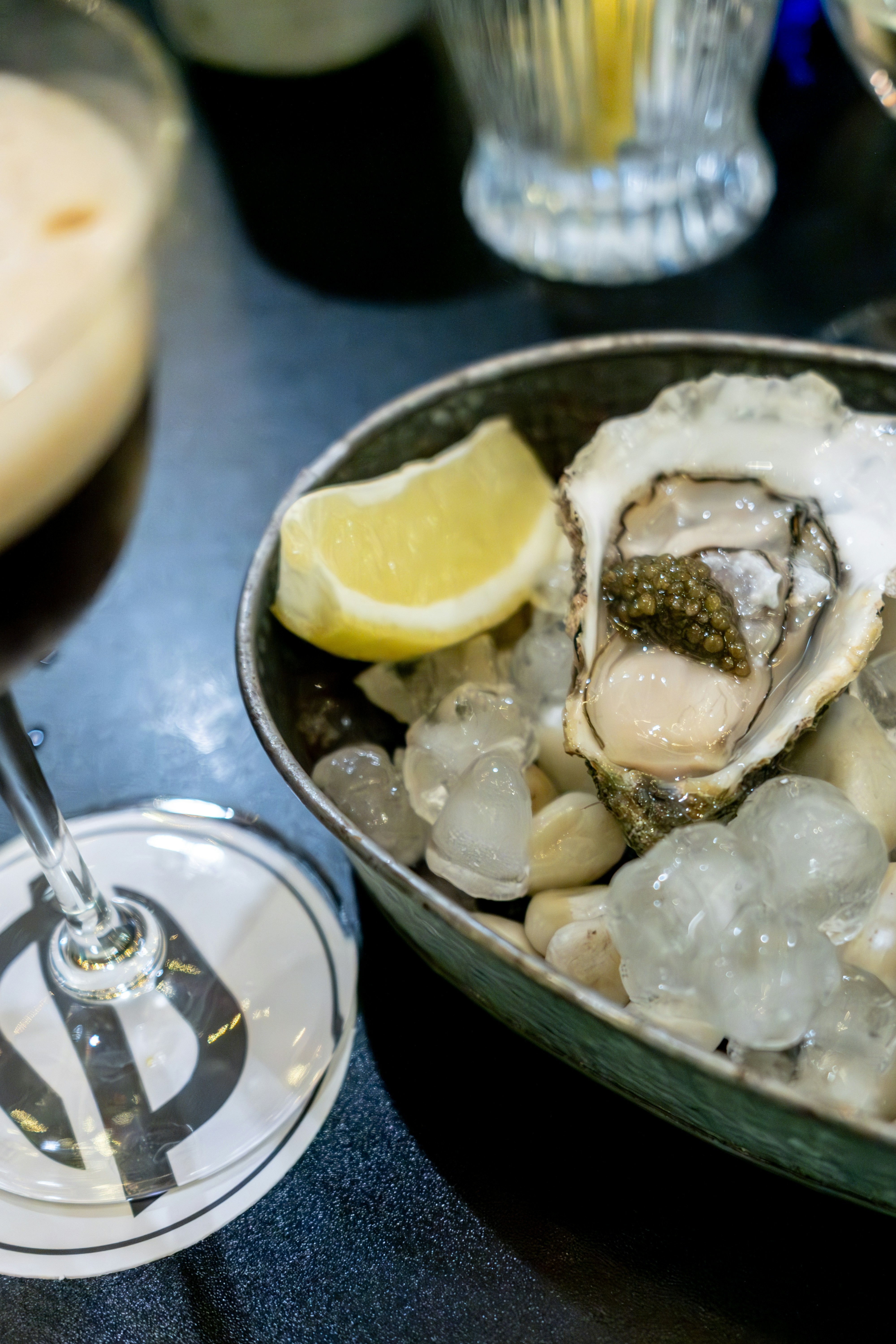 Fresh oyster served with lemon and ice