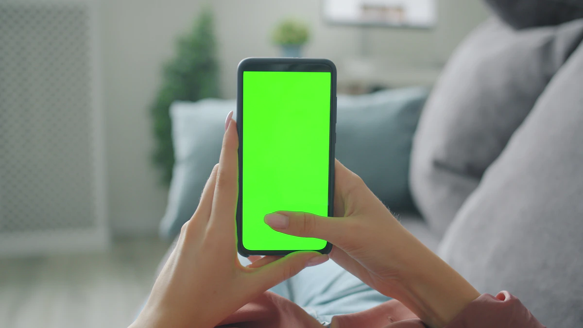Hand holding a smartphone showing a mobile app interface