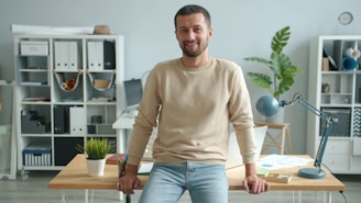 Man smiling in modern office setting