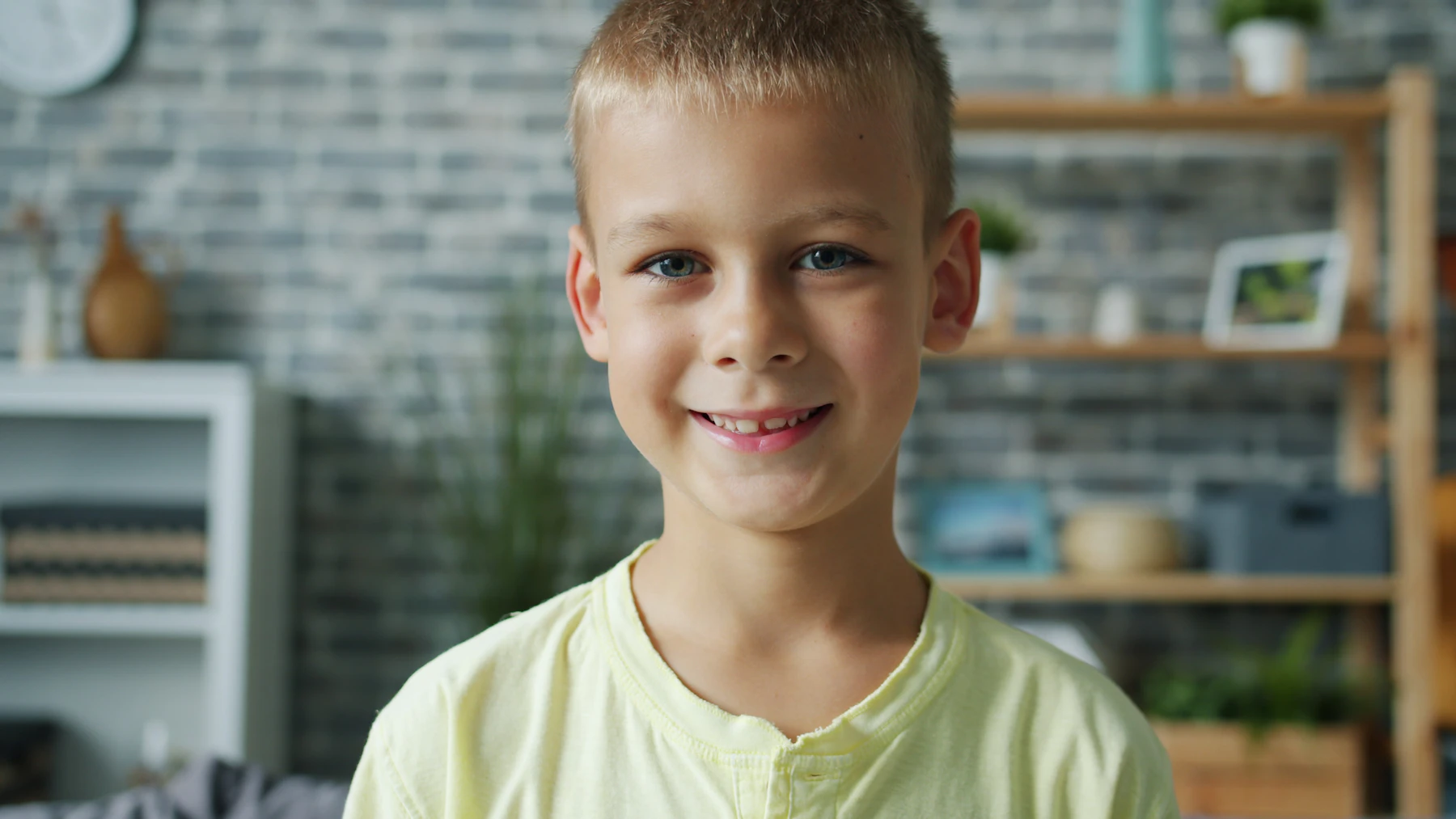 A young child smiling — the children we serve