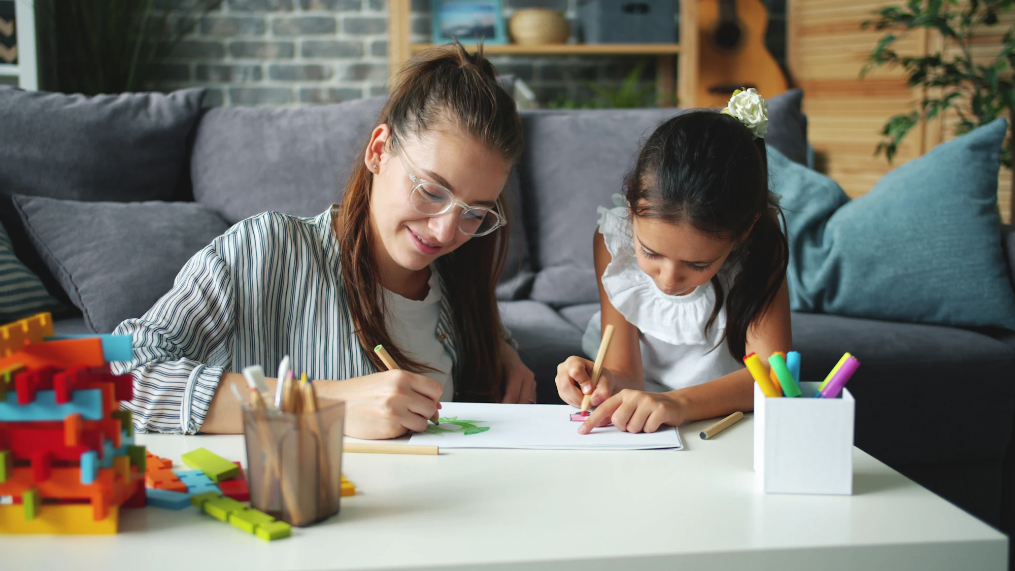 Mother and child drawing together