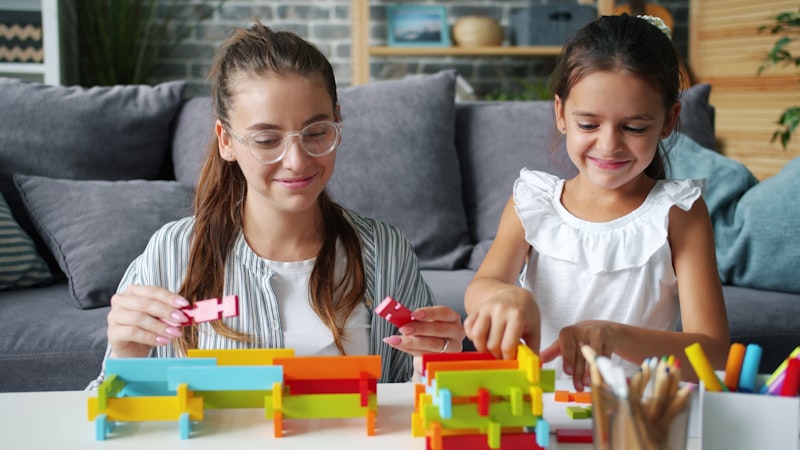 Woman and child building with blocks