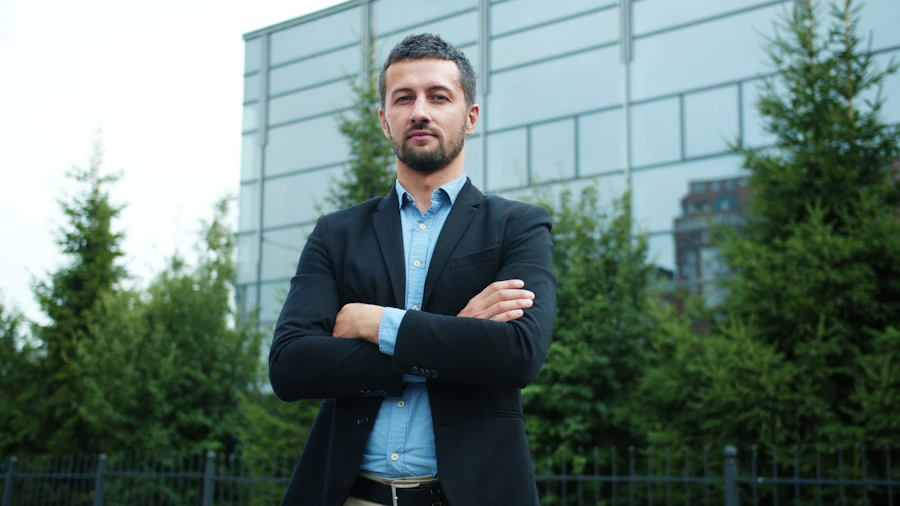 Executive in a suit in front of a business building