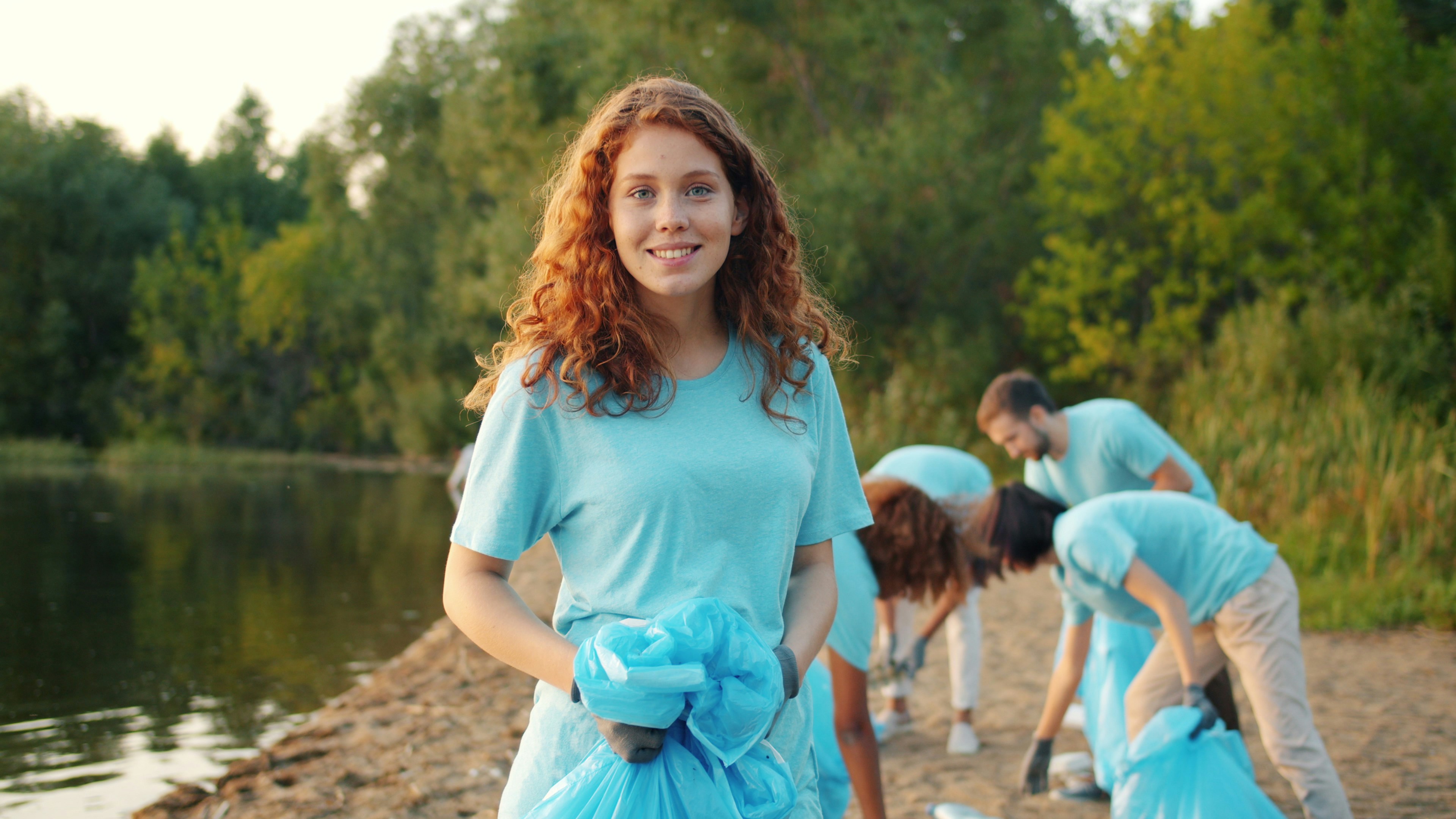 Volunteer cleaning beach