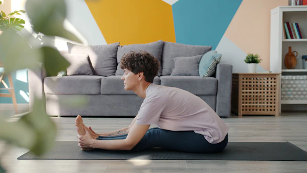 Woman doing a gentle home workout on a yoga mat