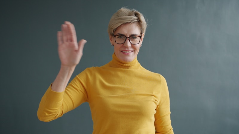 friendly Australian woman warmly greeting new connections