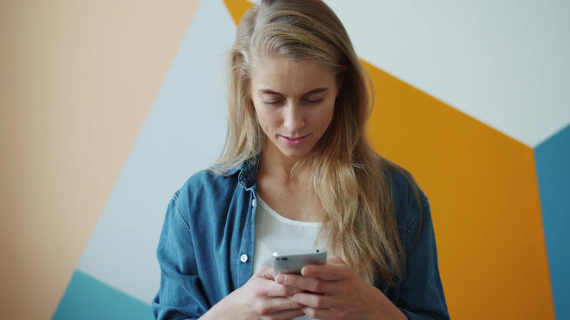 Woman messaging on smartphone