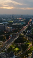 Busy highway interchange in a city at dusk