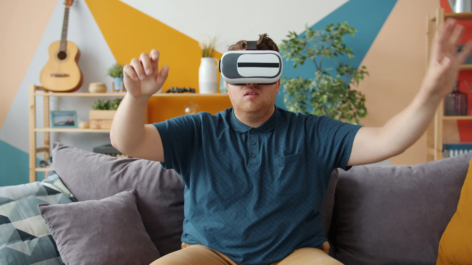 Freelance designer wearing a VR headset interacting with a spatial computing interface