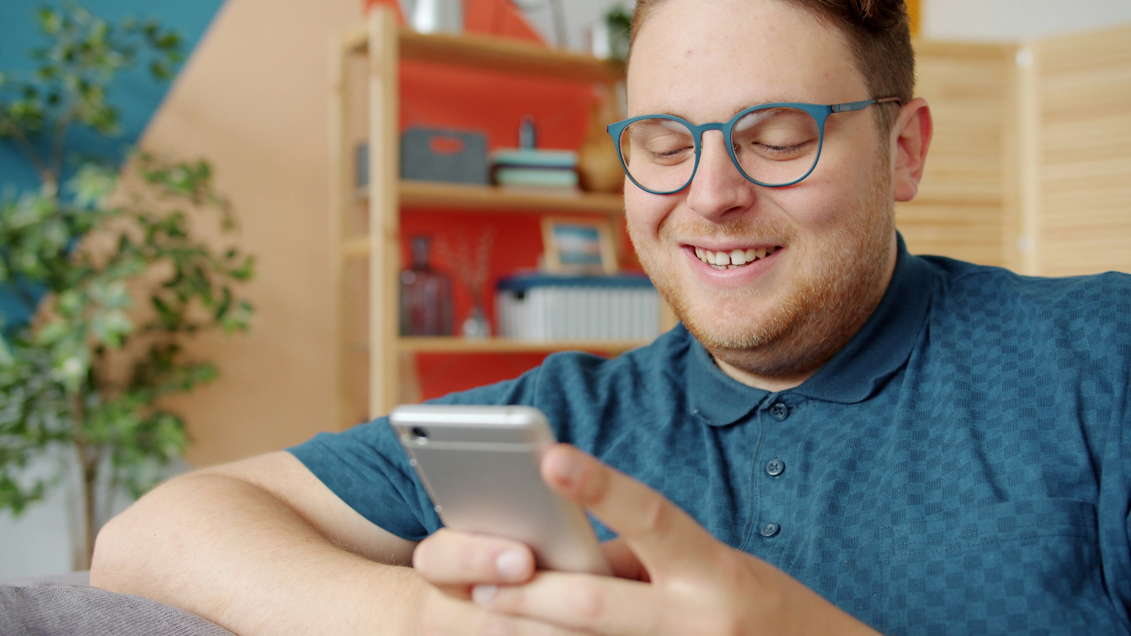 A close-up of a bookshelf filled with colorful books.