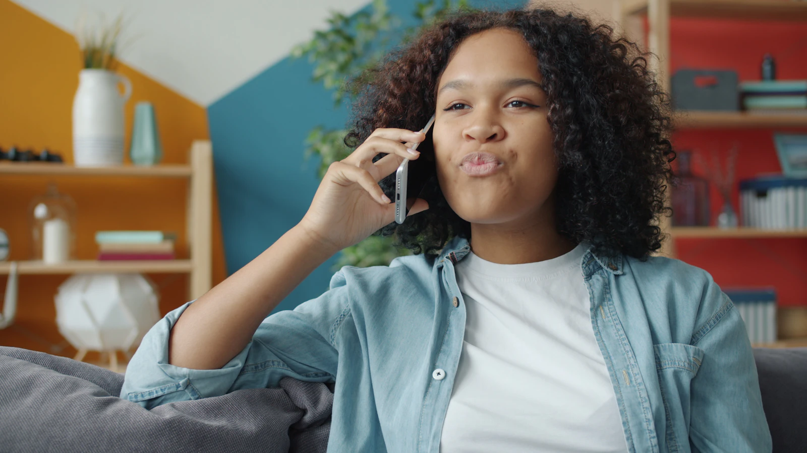 Person using a phone during some spare time at home