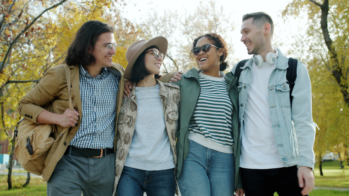 A diverse group of friends walking and talking together in a park