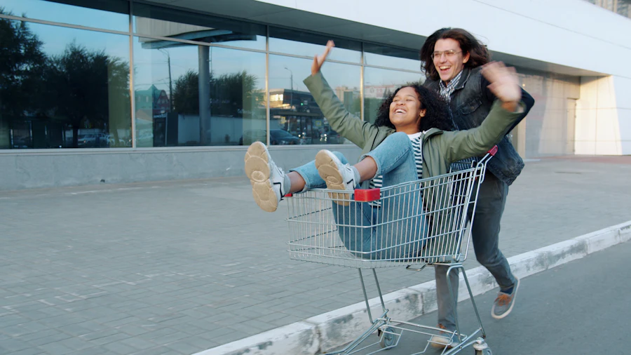 Two friends joyfully riding in a shopping cart