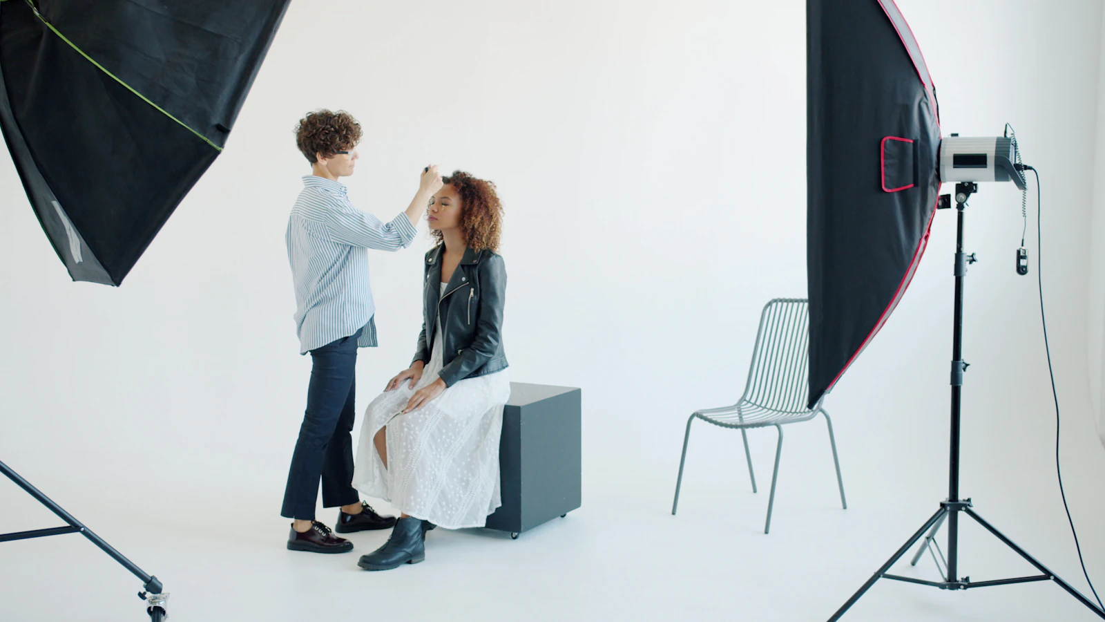Professional makeup artist working on a beauty look