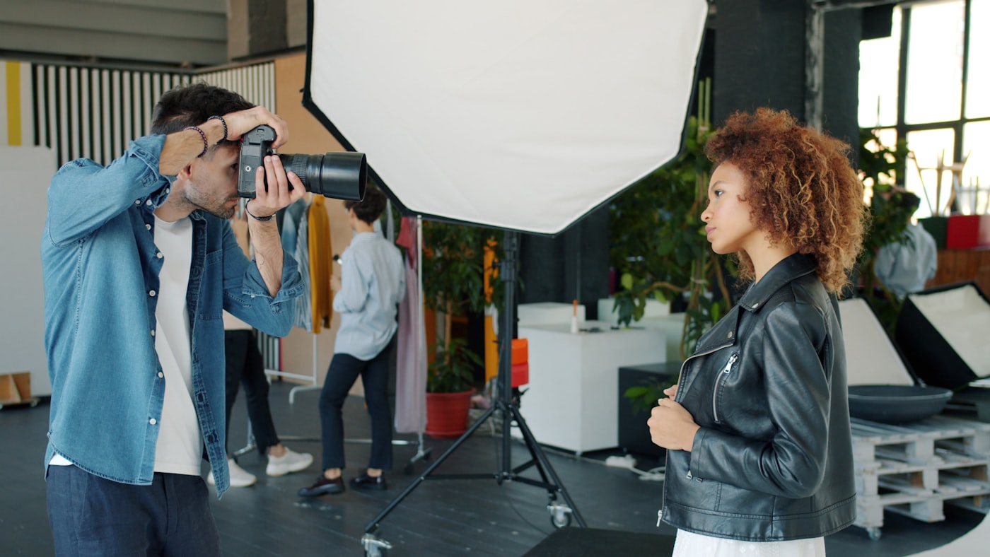 Photographer working a studio set