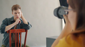 Man posing for a professional photographer in studio