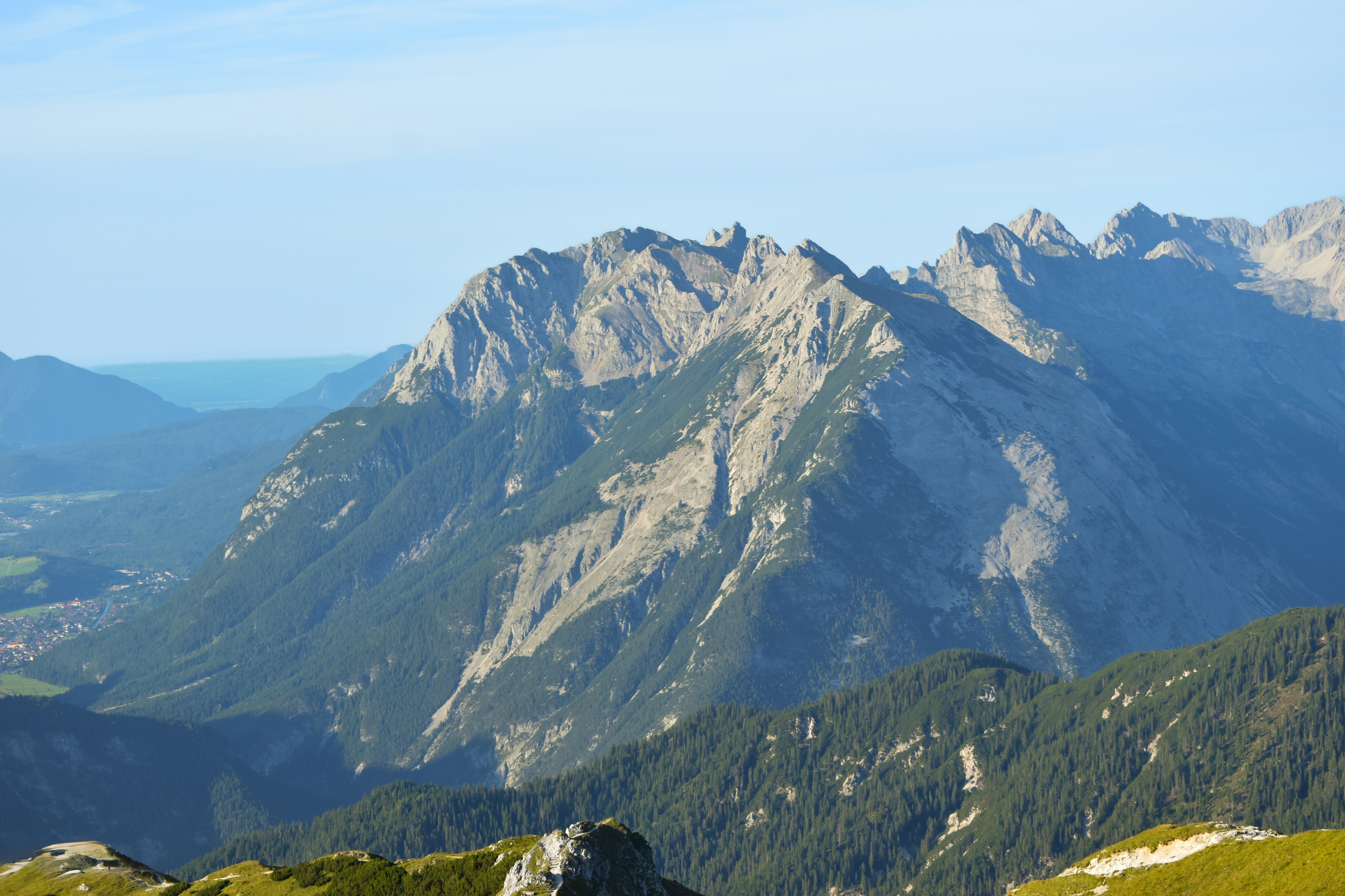 Jagged mountain range under a clear blue sky