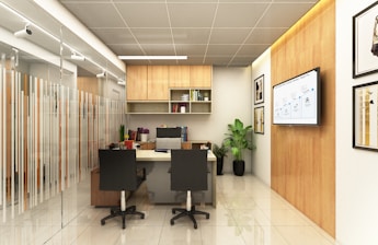 Modern office with desks and wood accents.