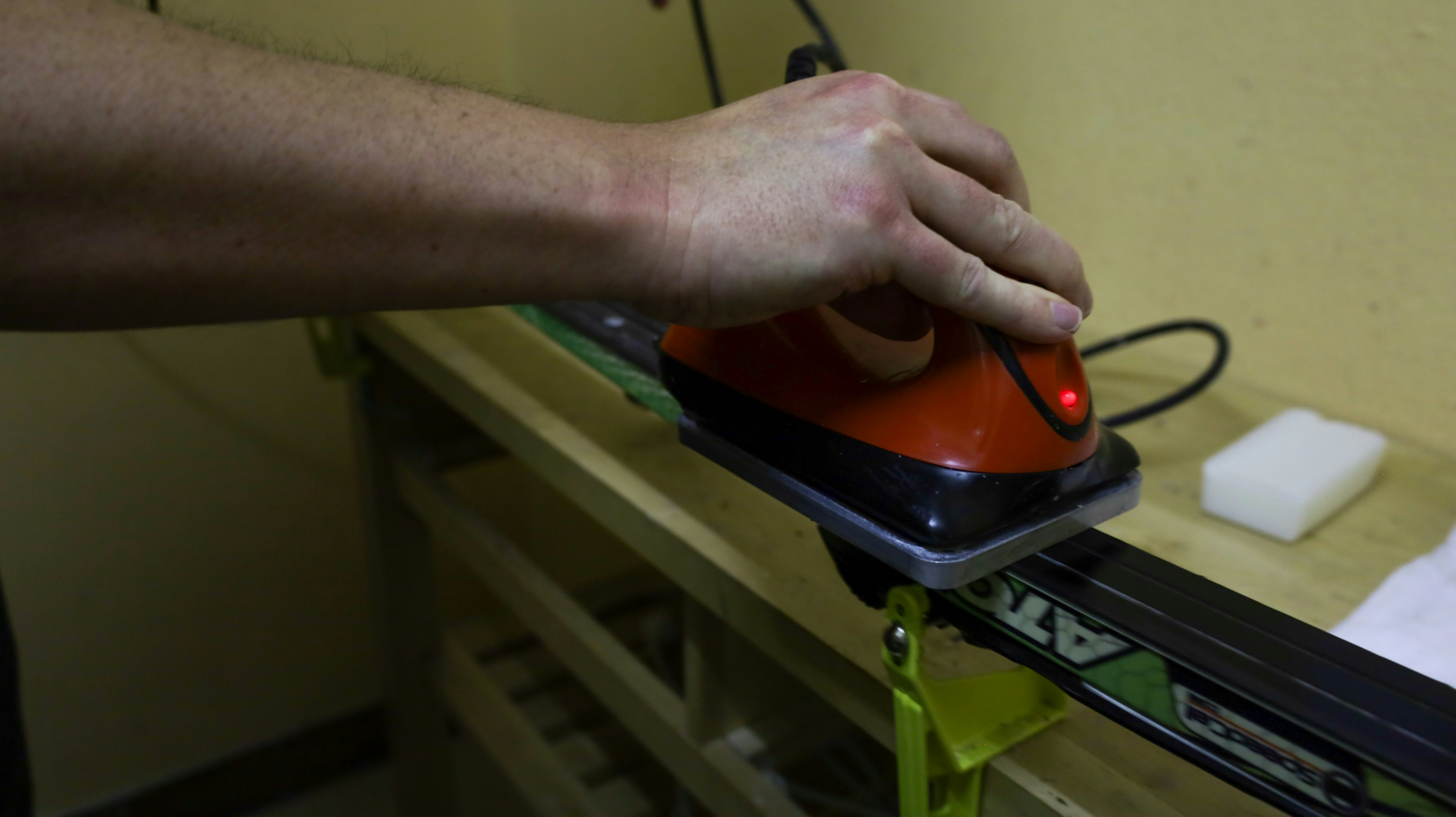 A cross country (langlauf) ski being waxed