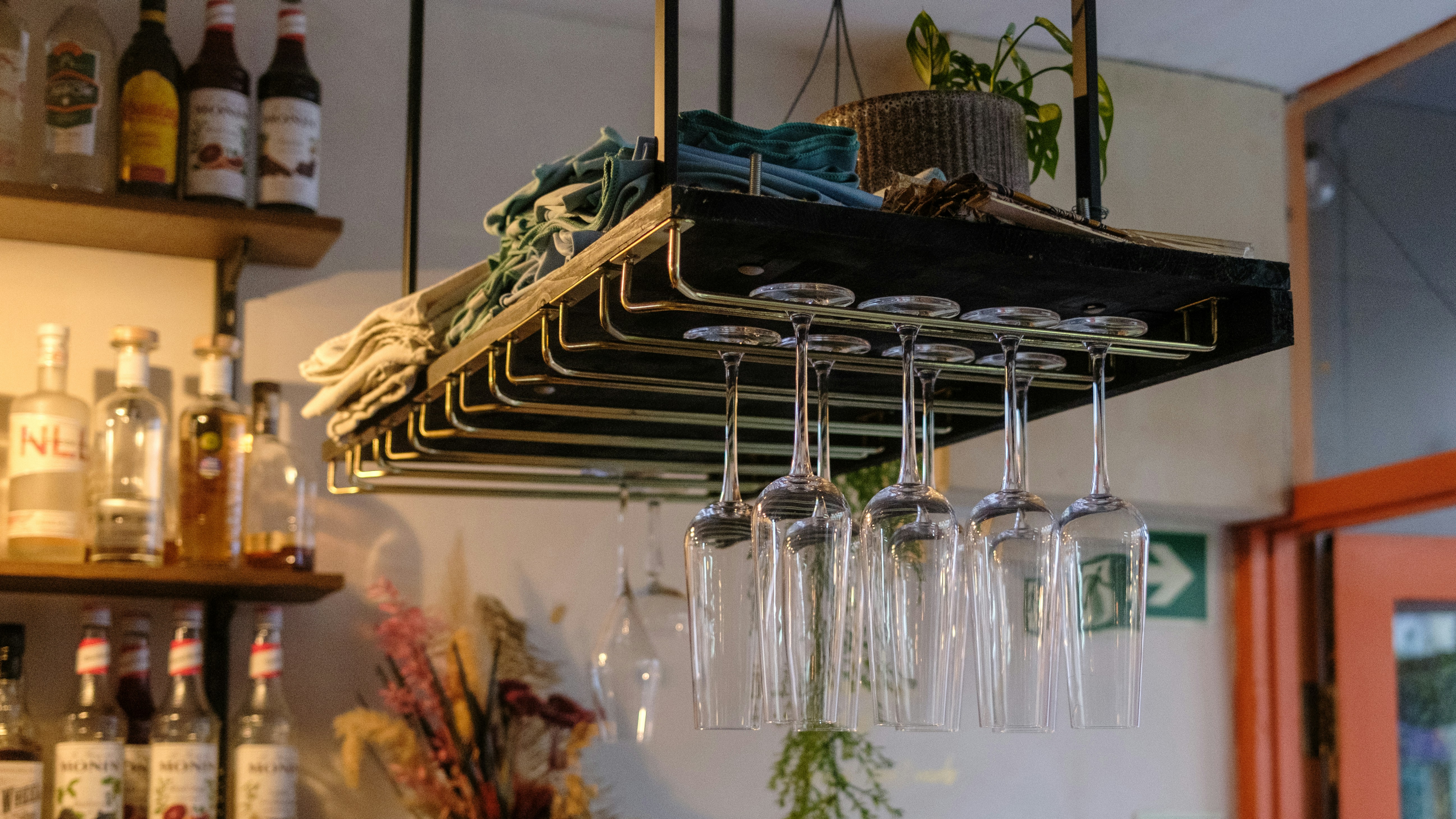 Hanging rack with wine glasses