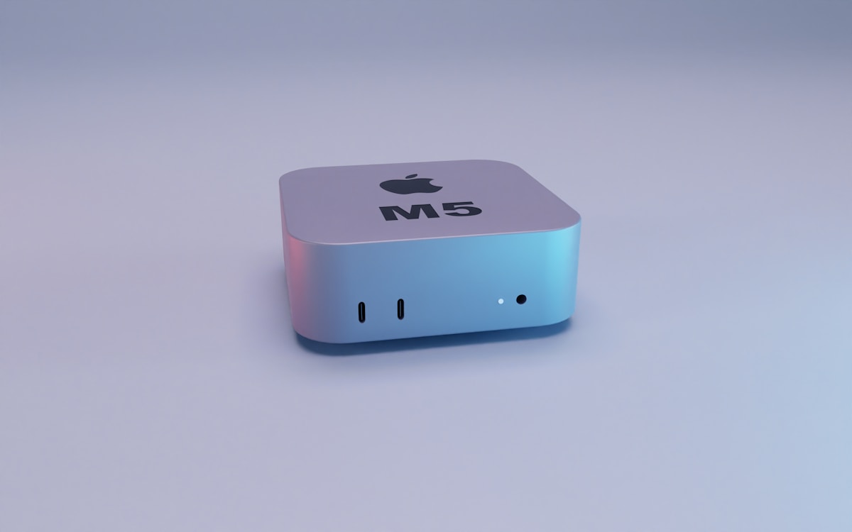 Apple m5 computer on a light background.