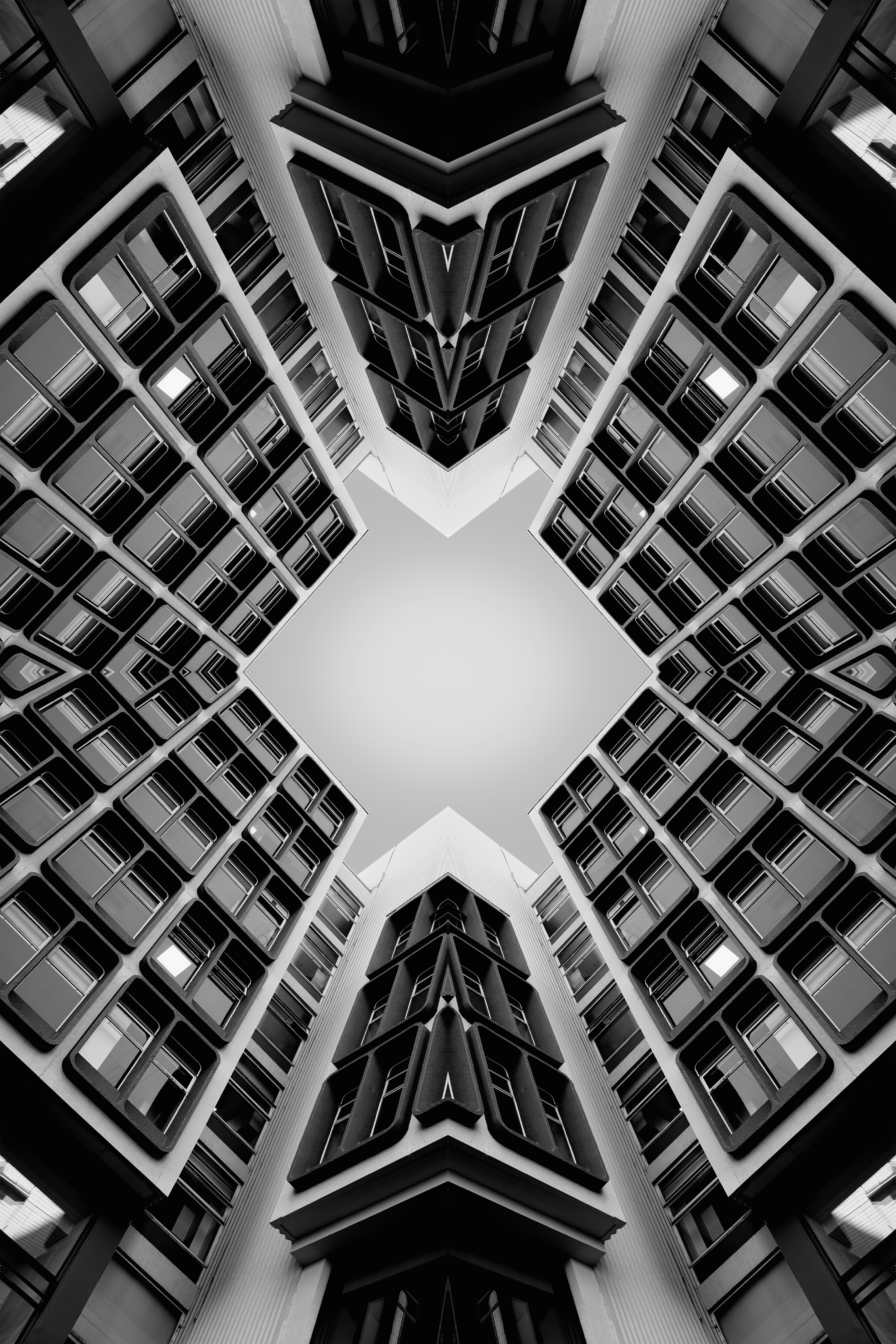 Symmetrical abstract view of buildings looking upwards