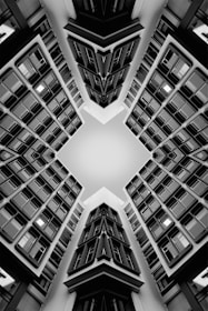 Symmetrical abstract view of buildings looking upwards