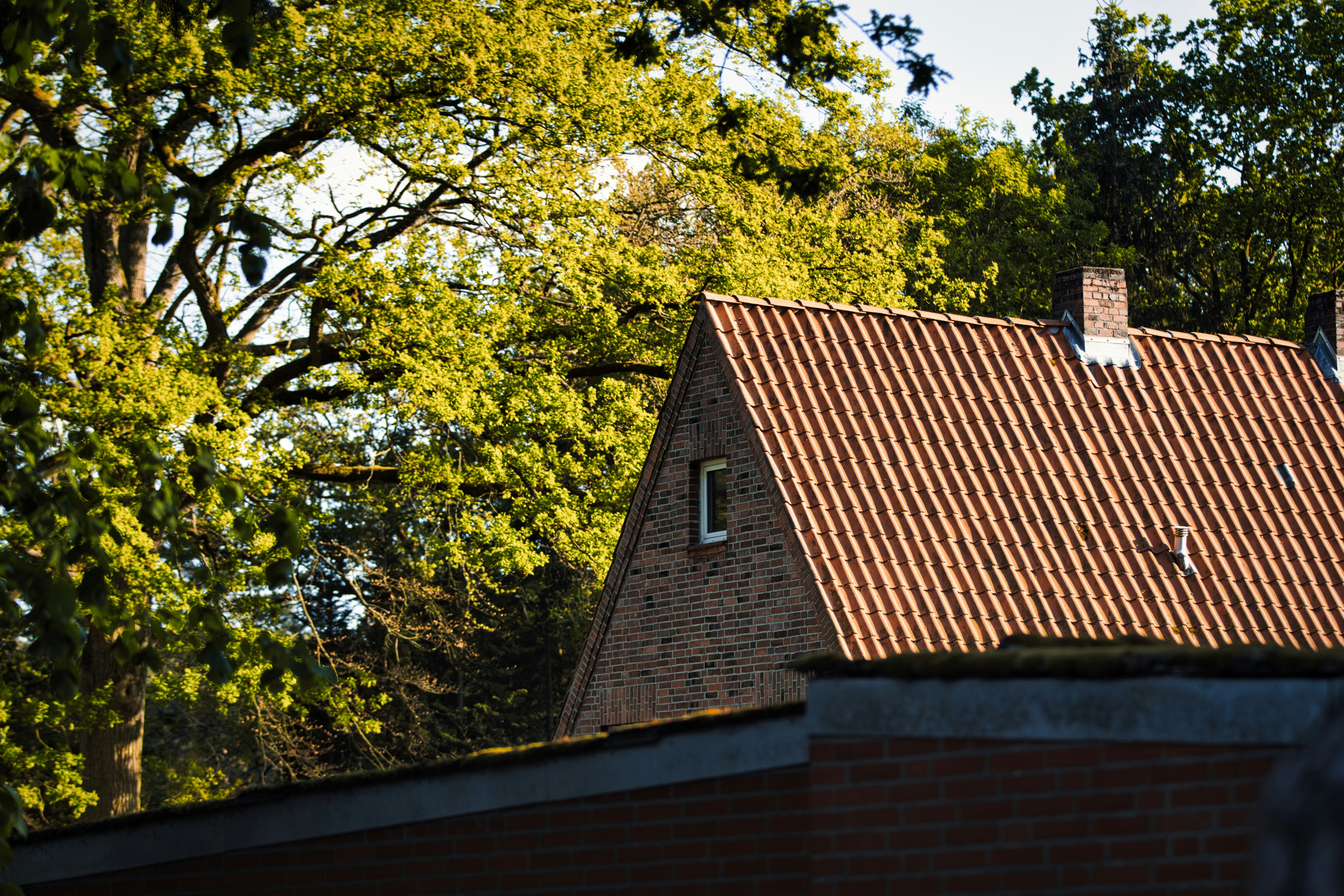 Modern standing seam metal roof on a residential home - tall pines roofing contractors rochester ny