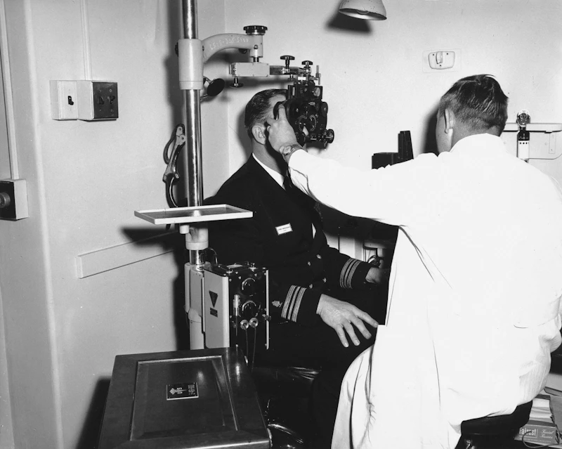 Vintage ophthalmic refraction unit in a clinical setting.