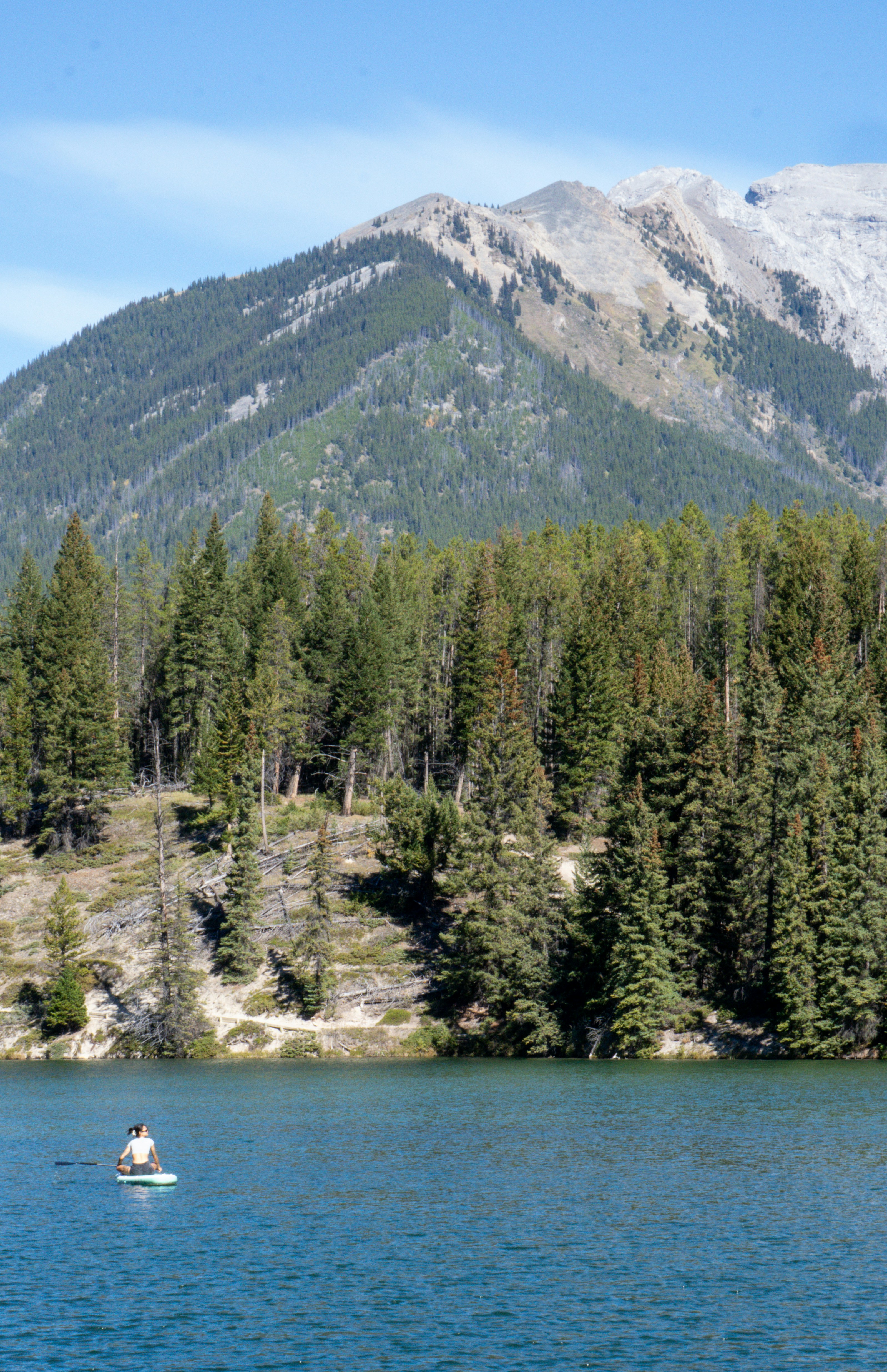 Suitcase with a passport and world map.