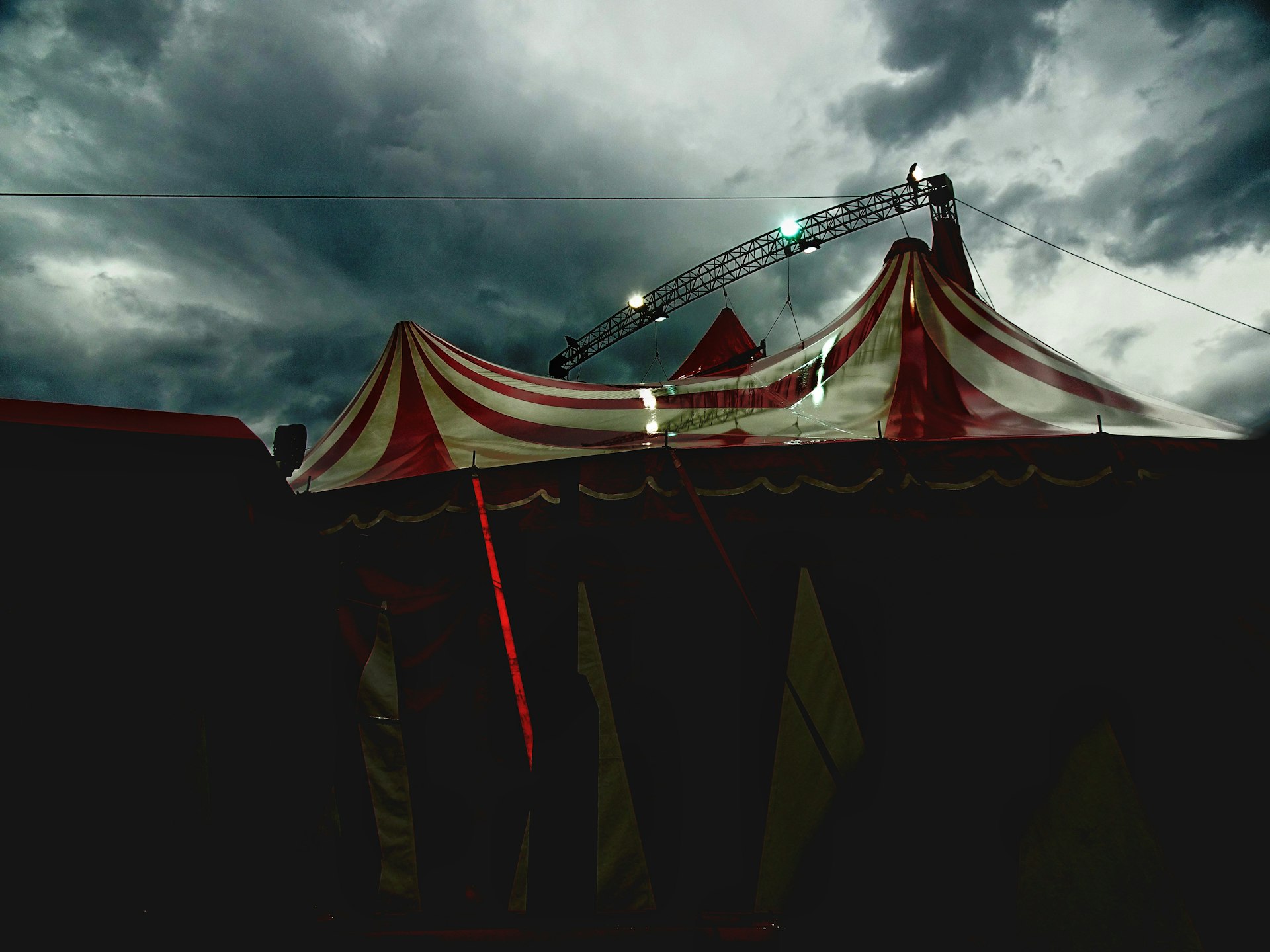Circus tent under a stormy sky