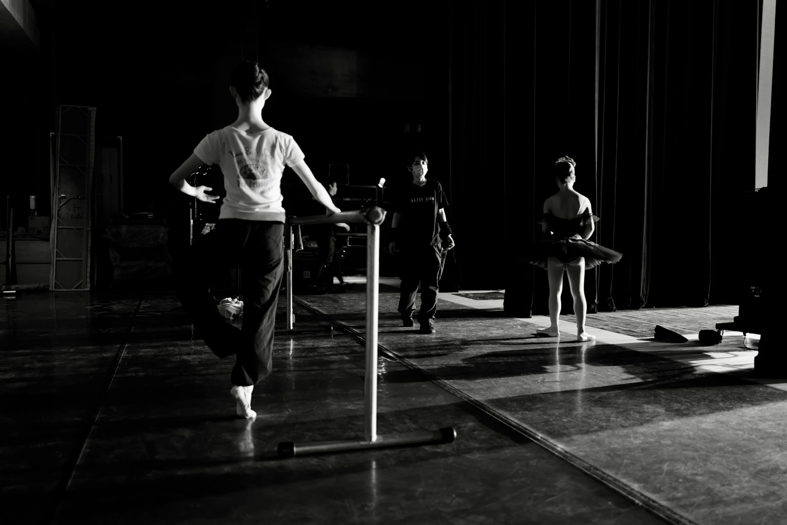 Dancers practising at the barre