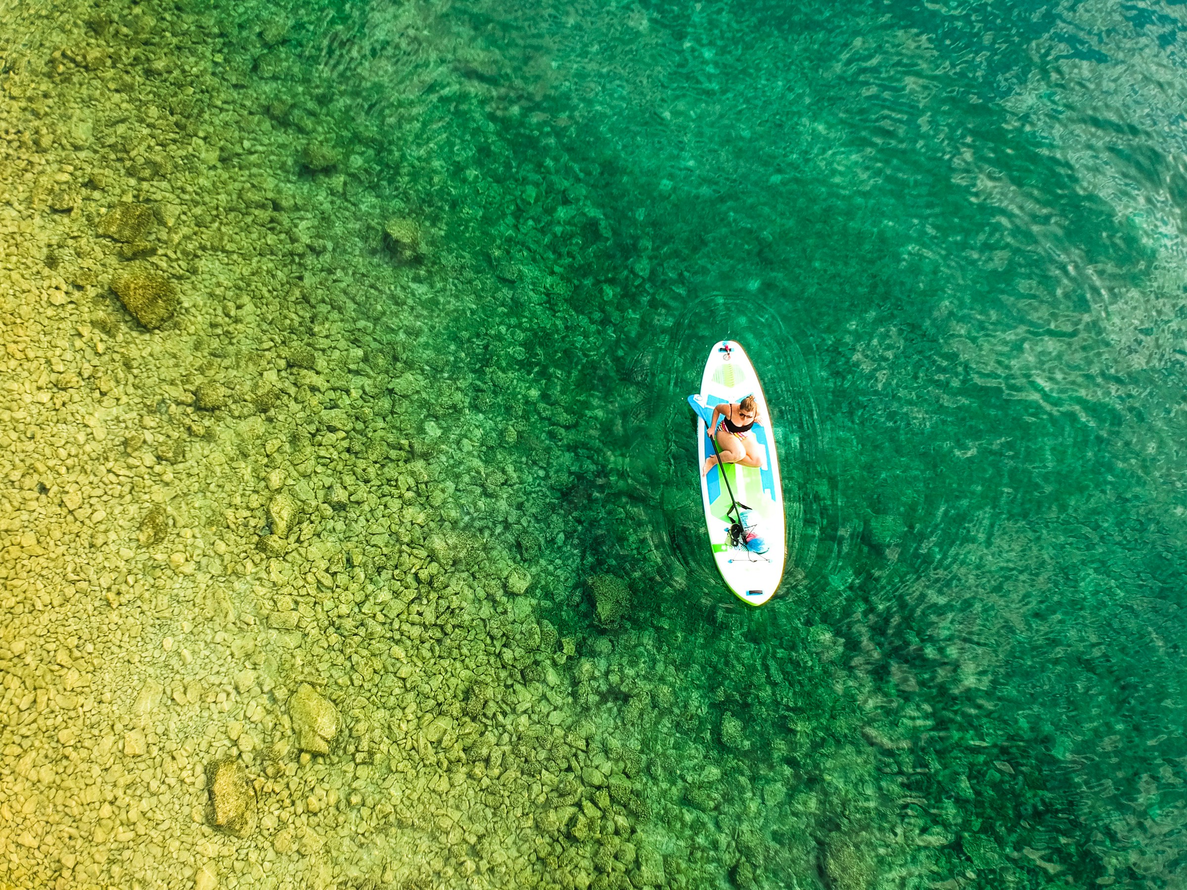 Stand-up paddleboarding on the Mediterranean