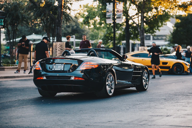 Sleek black convertible, a sugar mummy's luxury ride