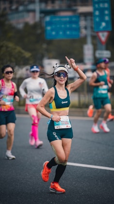 Woman with panda ears running a marathon race.