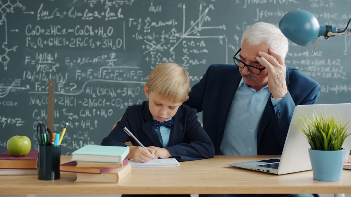 Teacher helping a middle school student at a desk after adopting AI tools for middle school teachers in 2026