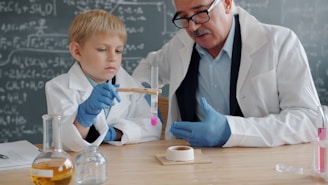 Teacher and student conducting science experiment in classroom.