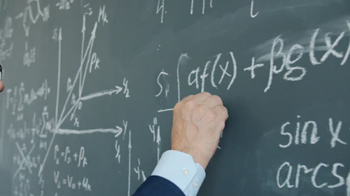 Mathematical formulas on a blackboard