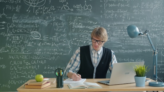 Indian student studying at desk