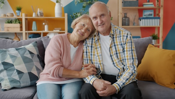 Happy couple in their home