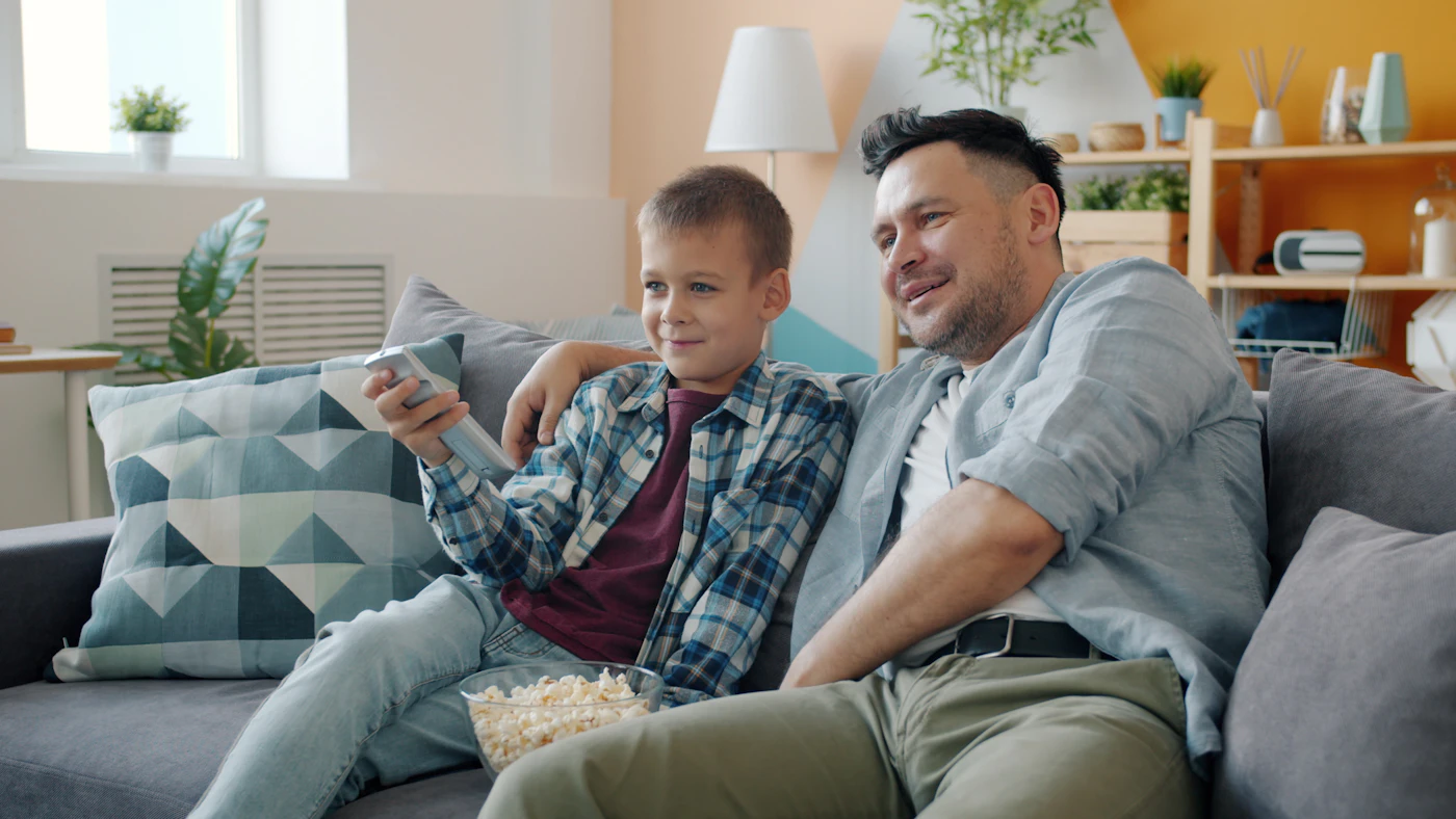 A family watching TV together