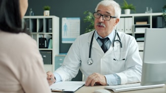Doctor talking to patient in an office.